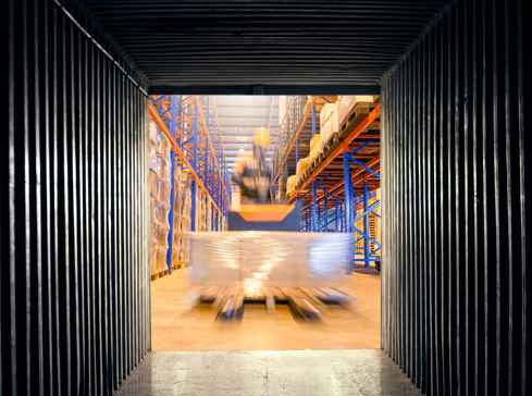 Internal of warehouse with person working