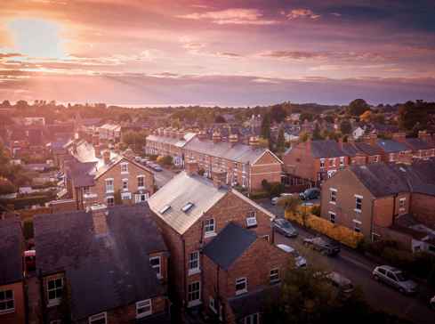 view over UK housing estate captured by a drone