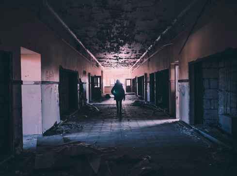 Abandoned building with a person exploring